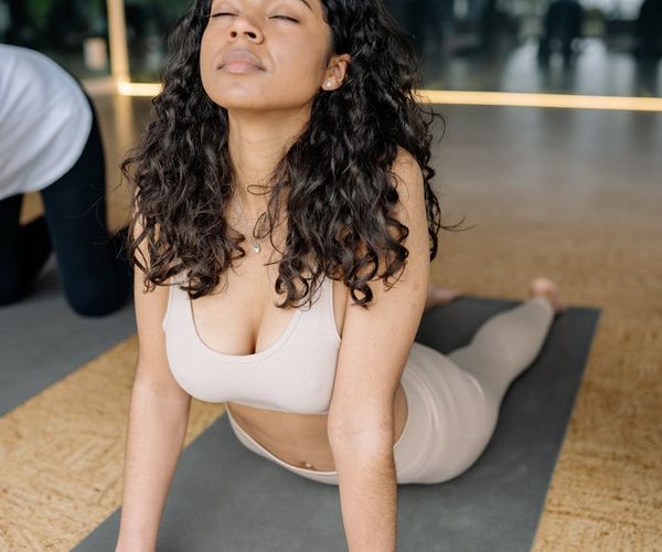 A calendar and a yoga mat, symbolizing the routine of regular practice.